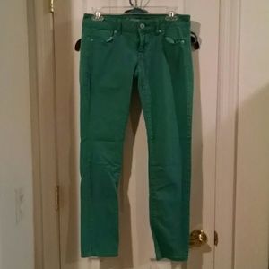 Teal American Eagle skinnies